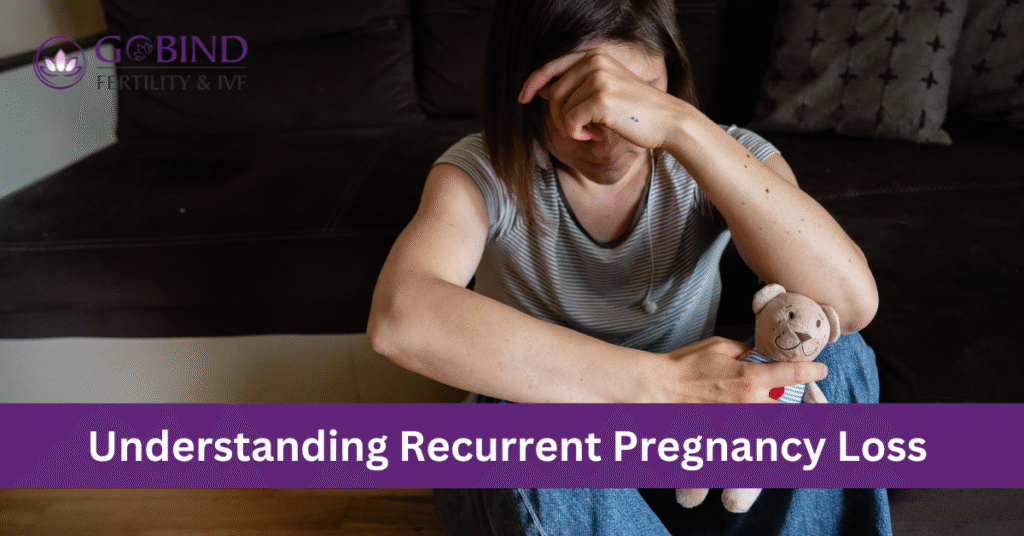 Understanding Recurrent Pregnancy Loss- A depressed lady with a toy in hand