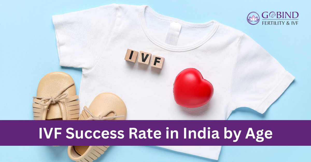 White baby t-shirt with wooden blocks spelling IVF, red heart shape, and baby shoes on blue background representing IVF success rate in India by age.